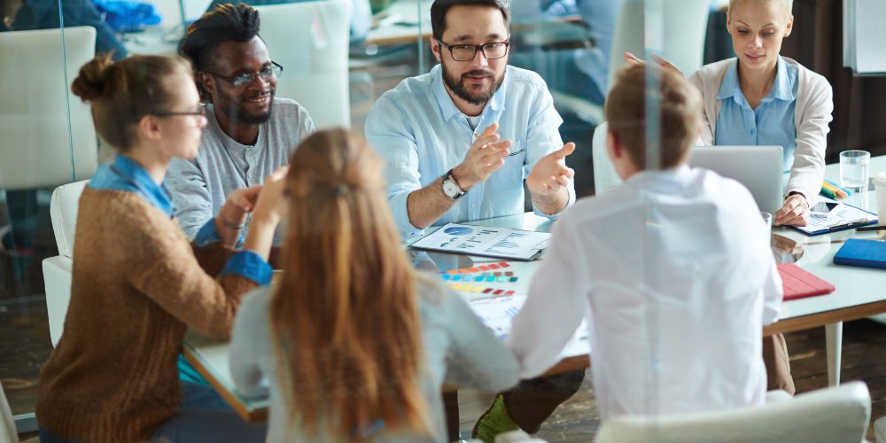 professionals having global mobility meeting, UK