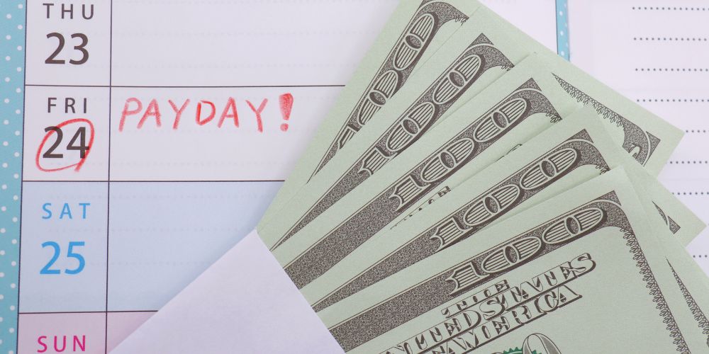 five hundred dollar bills and the payday date