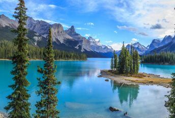 A picture of a serene Canadian lake reflecting the breath-taking beauty of nature