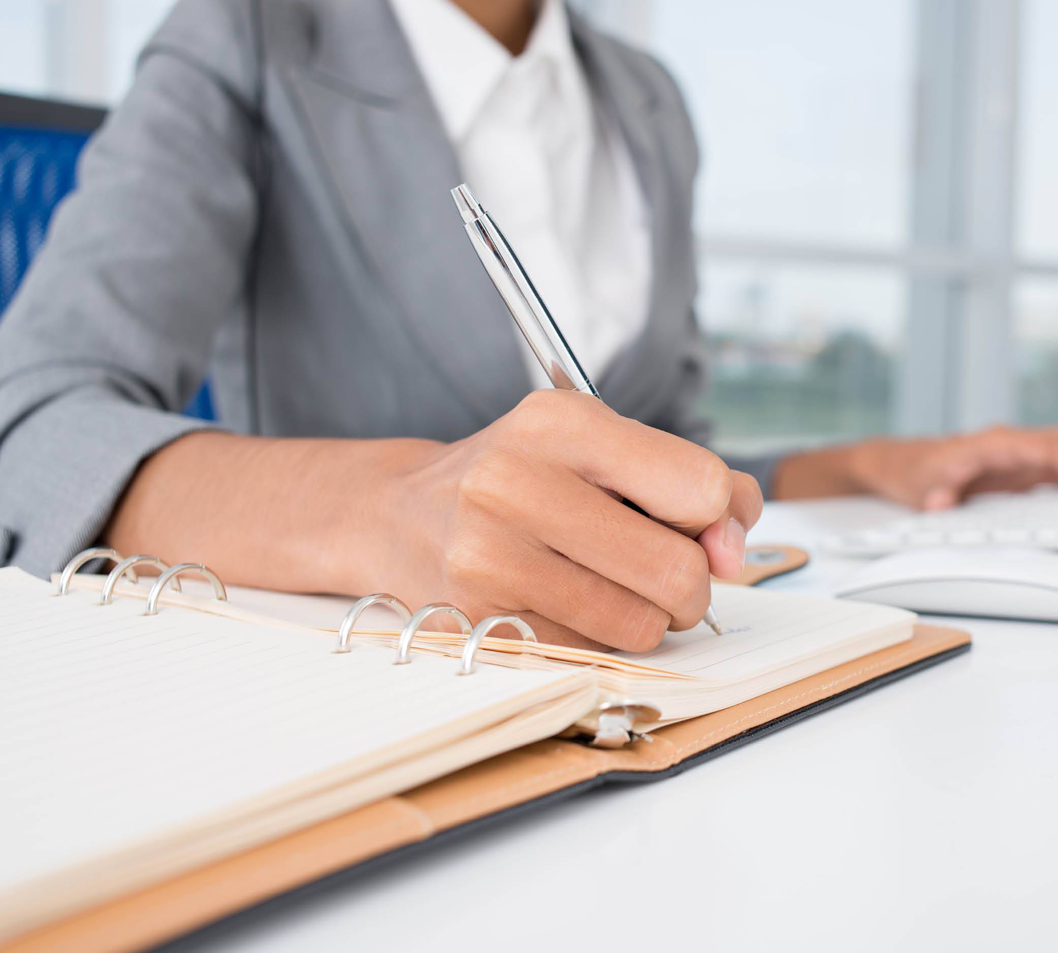 JMI woman writing slider