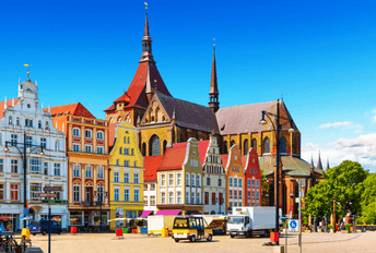 An image of colourful houses in a German town, featuring traditional architecture and steep roofs