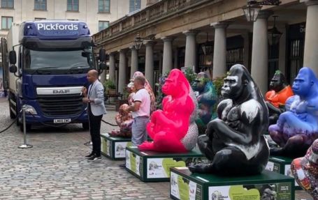 Pickfords truck delivering 15 life-sized gorillas for the Tusk Trail in Convent Garden, London