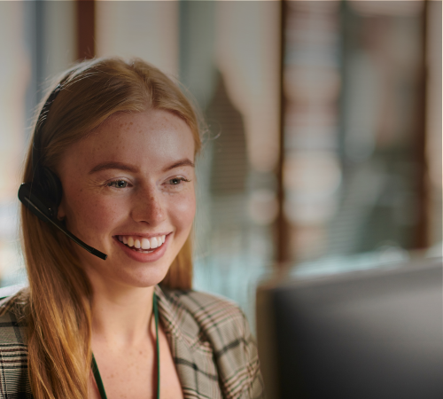 Relocation consultant speaking with an assignee over the phone, representing our exceptional end-to-end customer service support throughout the relocation process.