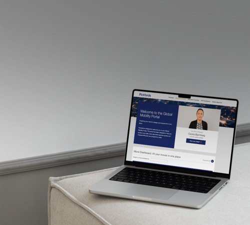 Assignee planning their move with moving boxes around them