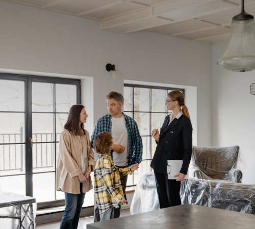 An image of an assignee and his family looking for a new home