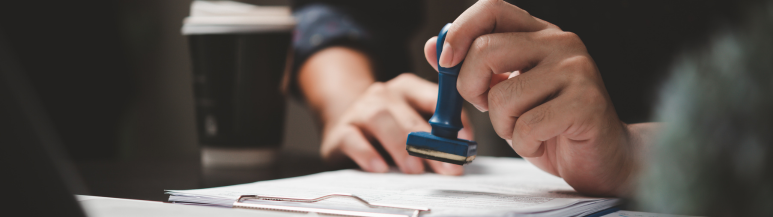 An image of a work visa being approved for an assignee